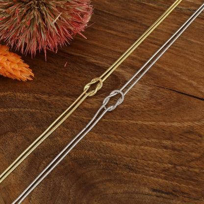 gold love knot herringbone bracelet – product image 12